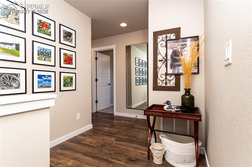 Image 30 of 36: Upstairs Hallway w/ LVP Flooring! 