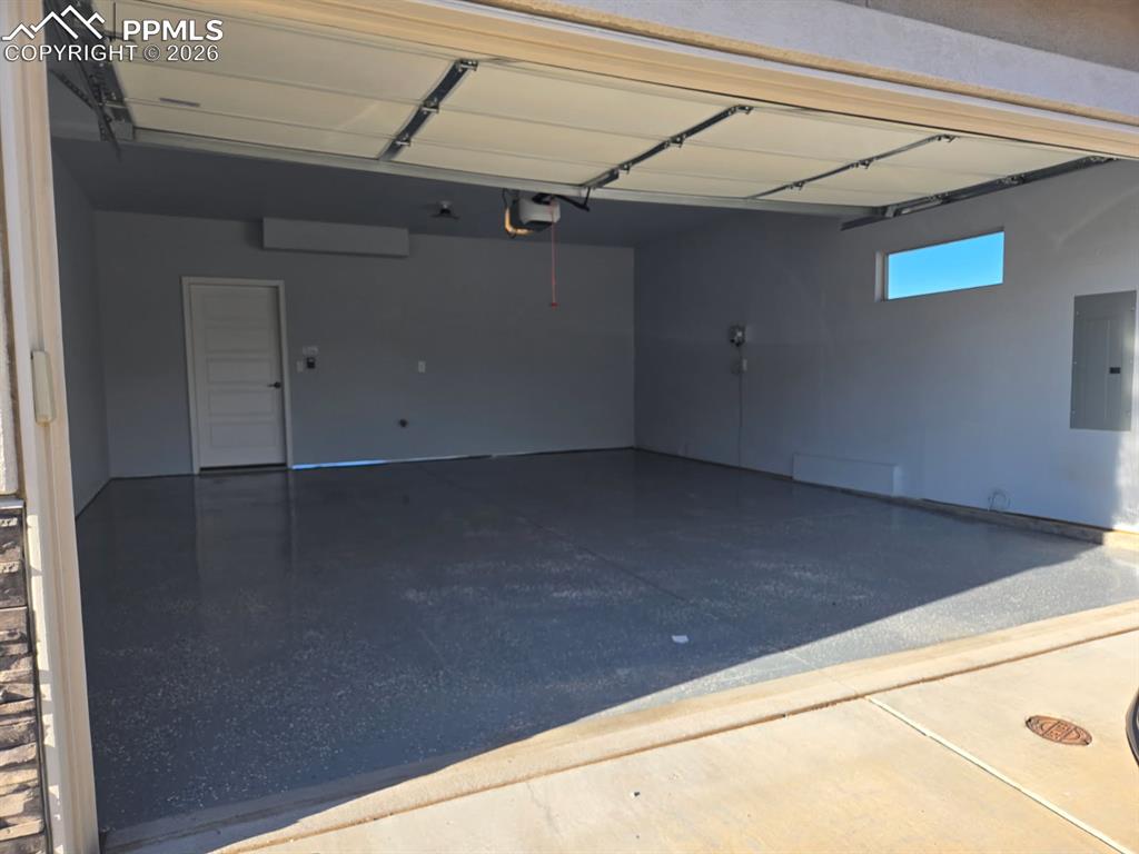 Image 34 of 36: Finished Garage w/ Epoxy Floors!  