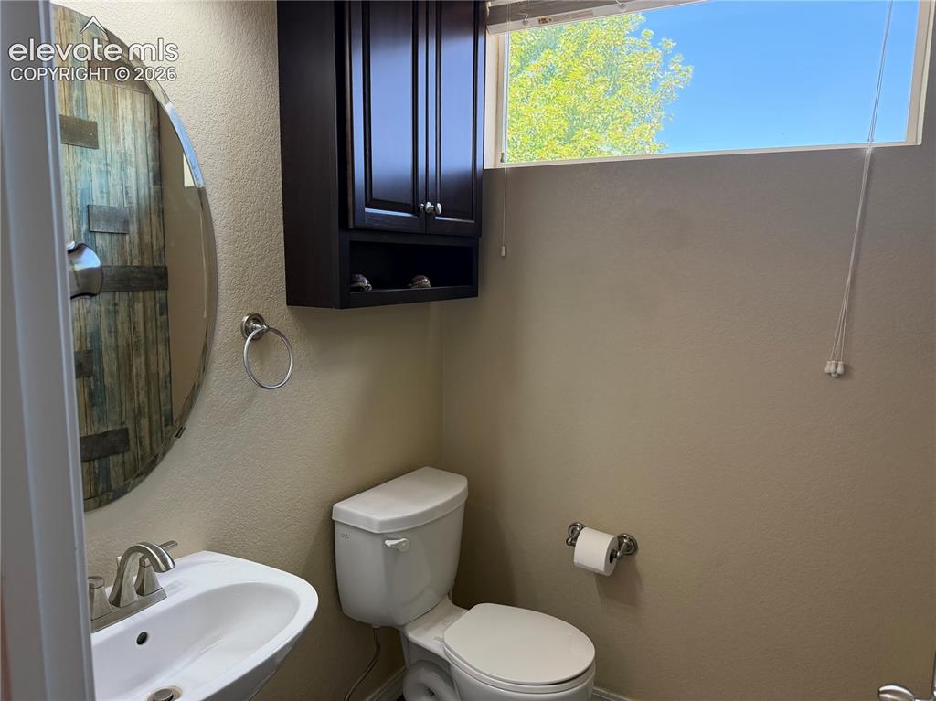 Image 10 of 44: 1/2 bath main level