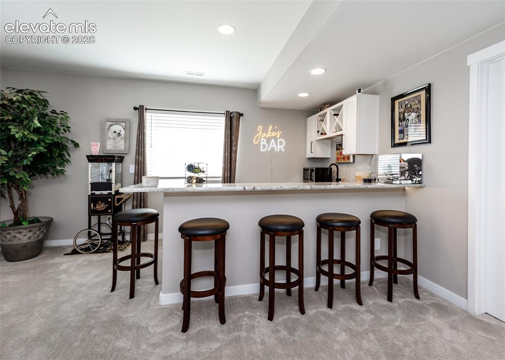 Image 36 of 50: Wet Bar in family room