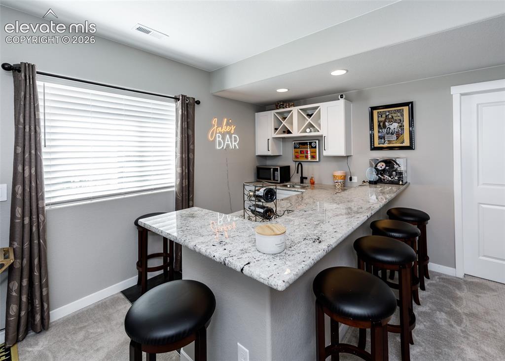 Image 37 of 50: Wet Bar in family room