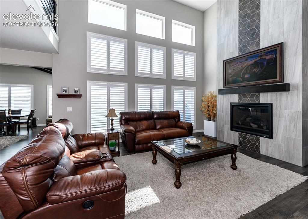 Image 9 of 50: Living room with fireplace