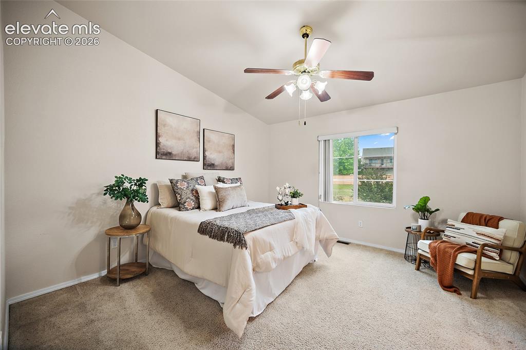 Image 10 of 26: Beautiful front porch and entry that looks out to a quiet walking trail.