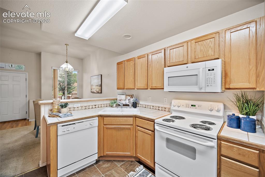 Image 8 of 26: Dining Room Off Of The Kitchen