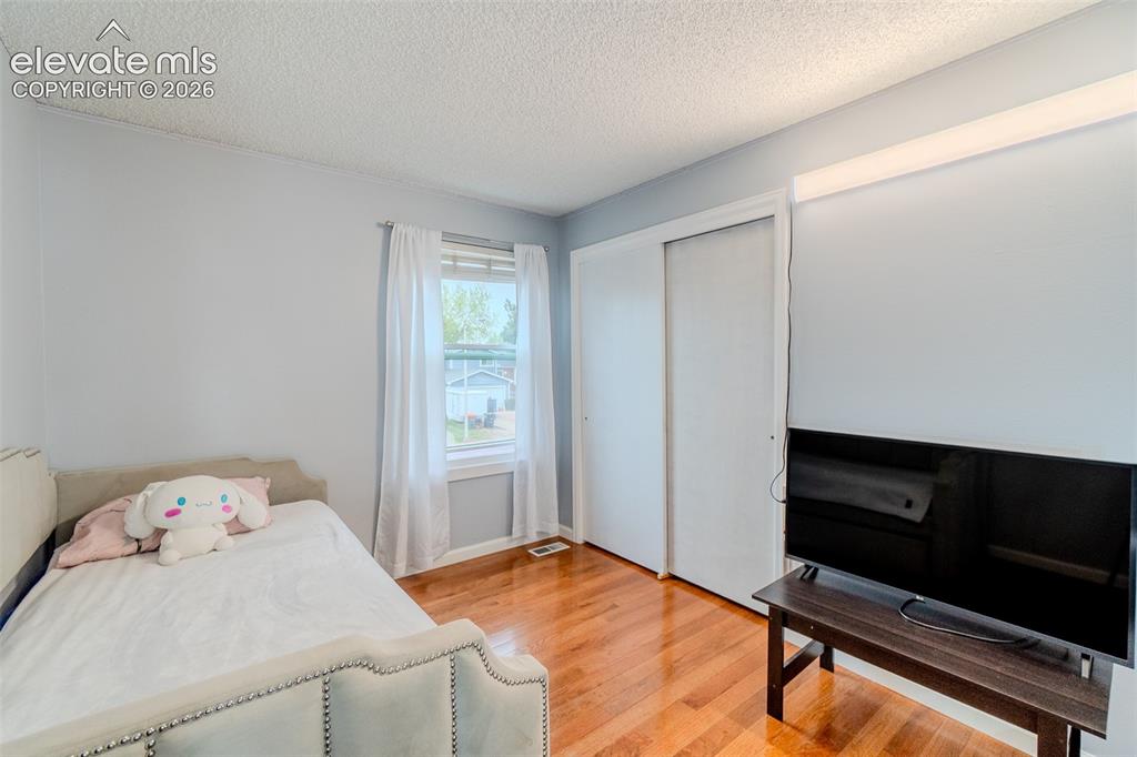 Image 17 of 33: Upstairs bedroom with spacious closet 