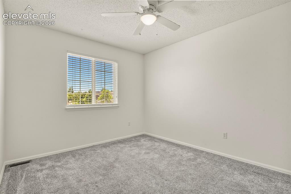 Image 25 of 46: Upstairs bedroom
