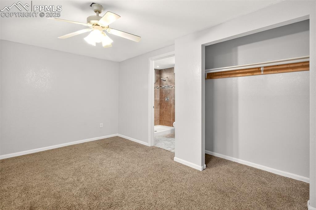 Image 33 of 46: Basement bedroom w/attached bathroom