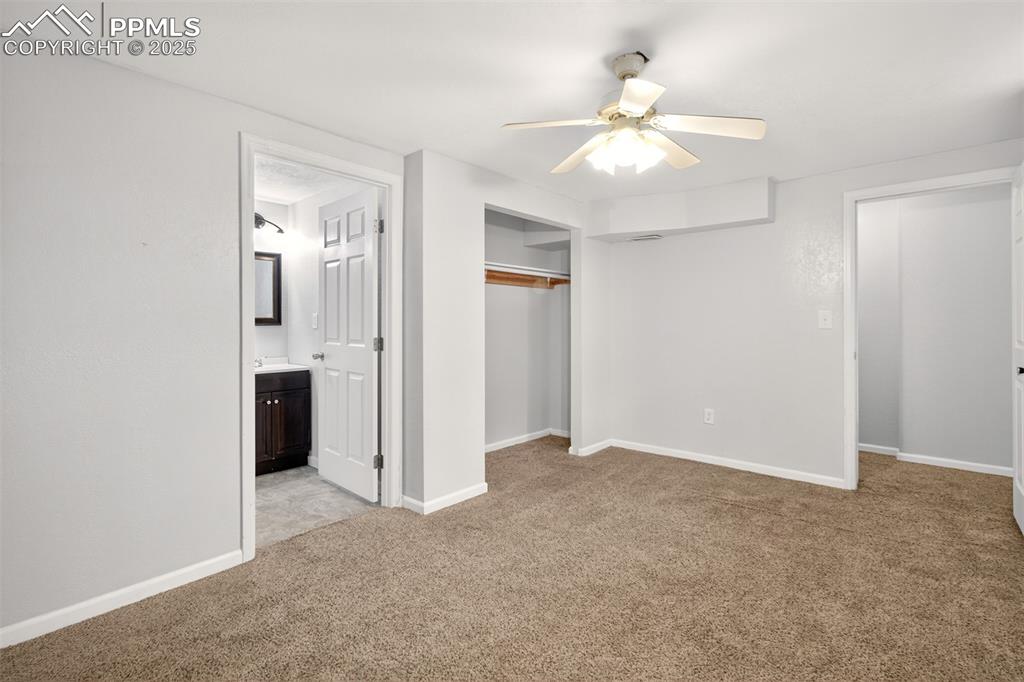 Image 34 of 46: Basement bedroom w/attached bathroom