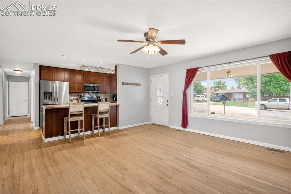 Image 6 of 46: Kitchen & Living Room