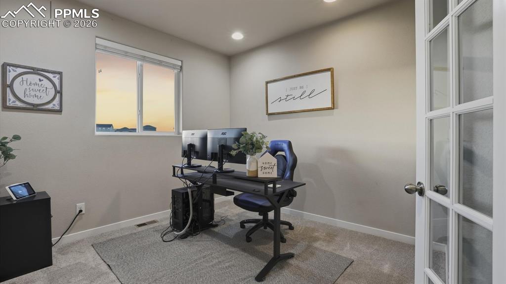 Image 10 of 50: Convenient Powder Bathroom.