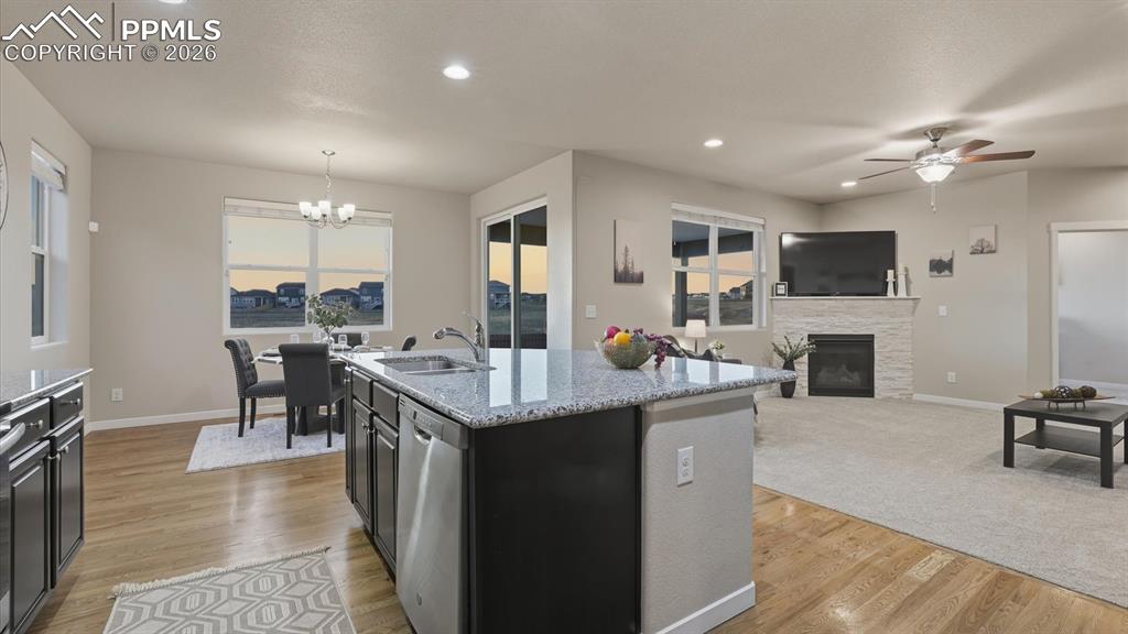 Image 12 of 50: French doors lead into a dedicated home office.