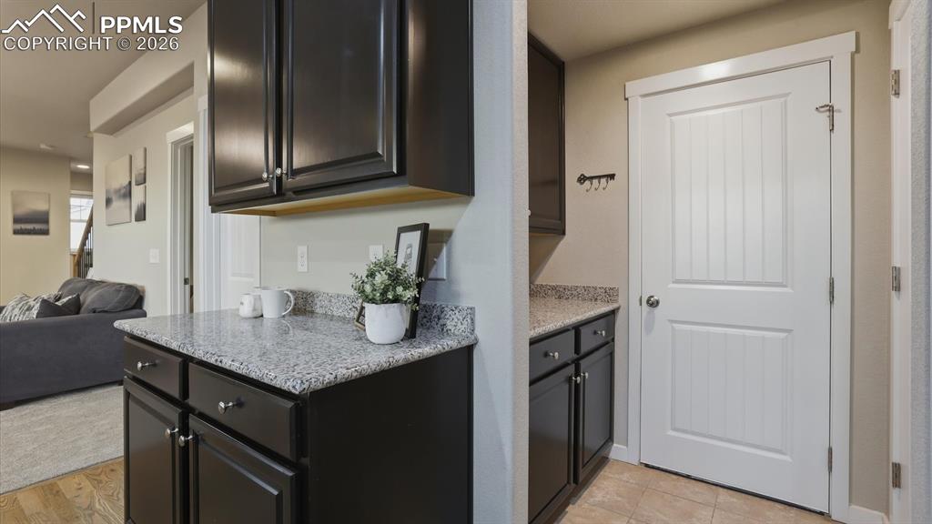 Image 19 of 50: View of the Dining Area, Kitchen, and Living Room.