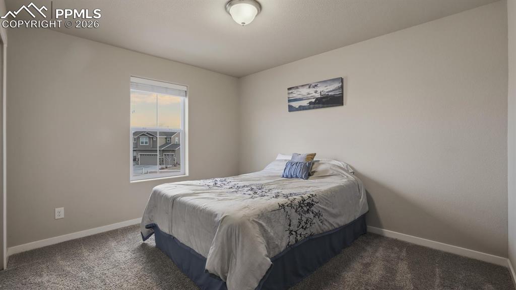 Image 30 of 50: Upper Level Primary Bedroom.