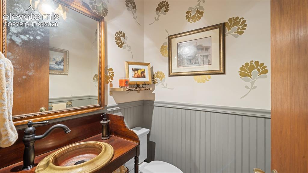 Image 15 of 42: Mian Level hall bath with artisan vessel sink!