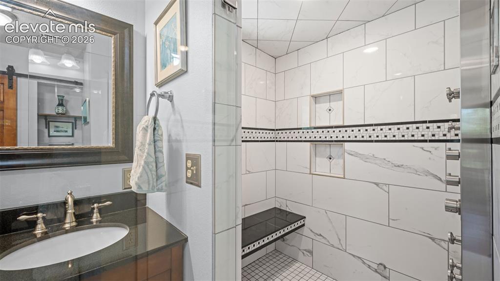 Image 20 of 42: Steam Shower! Built-In Storage * Multiplee Jets * Comfortable Bench 