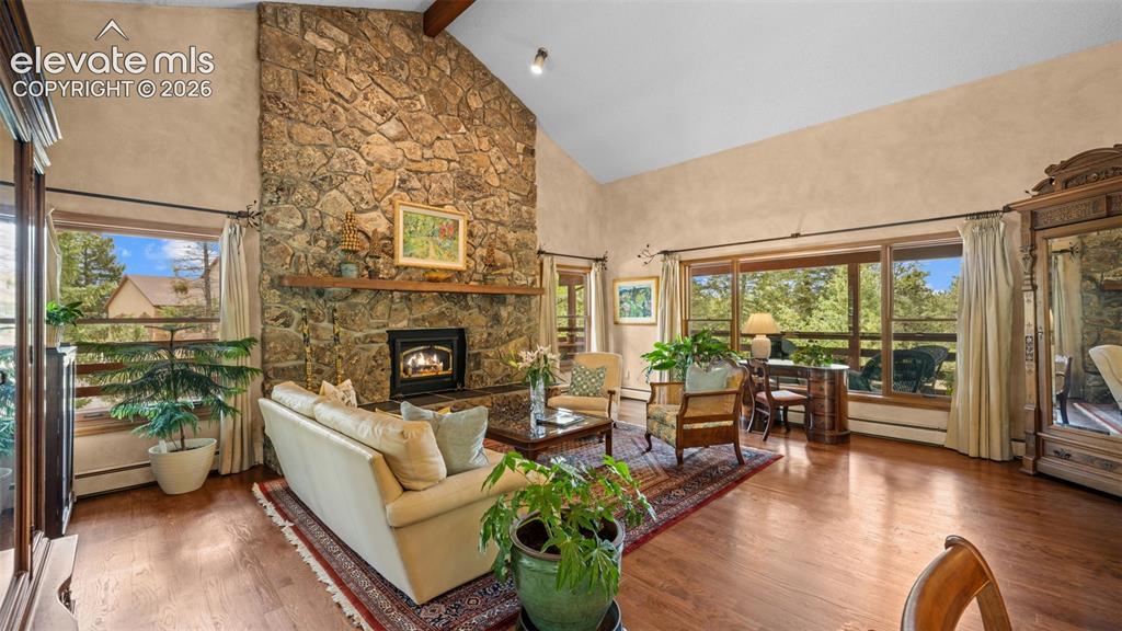 Image 6 of 42: Beamed vaulted ceiling * Genuine Hardwood Floors * Unique Artisan Curtain R
