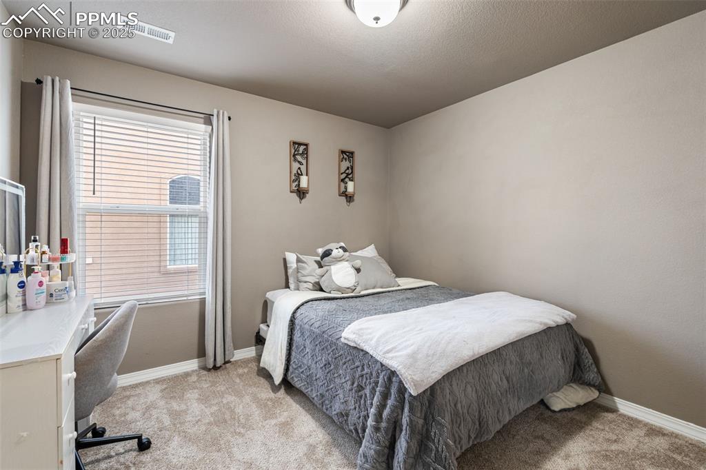 Image 28 of 43: Bedroom