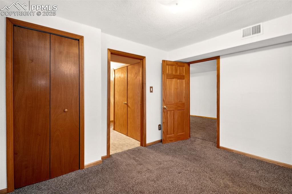 Image 16 of 21: Bedroom #4 With Attached Bathroom
