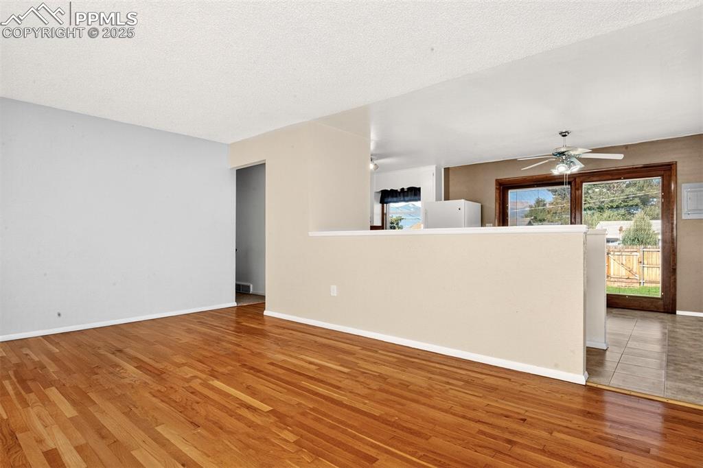 Image 4 of 21: Living Room Opens Ito The Dining Area/Kitchen, and Walk-Out To The Back Yar