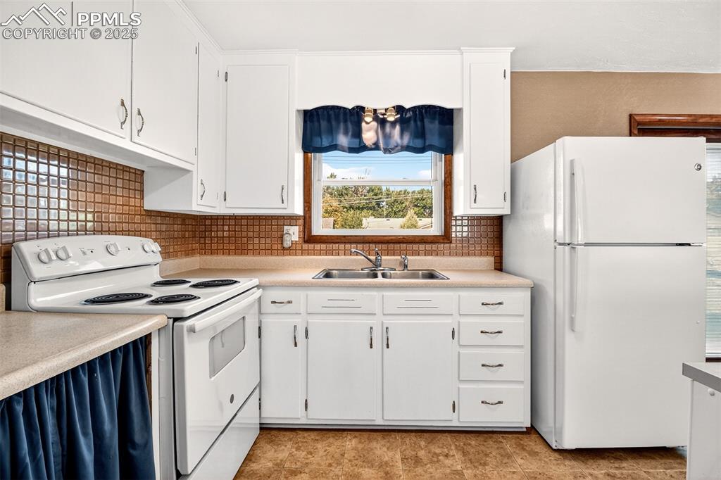 Image 6 of 21: Tile Backsplash, Mountain View From The Window