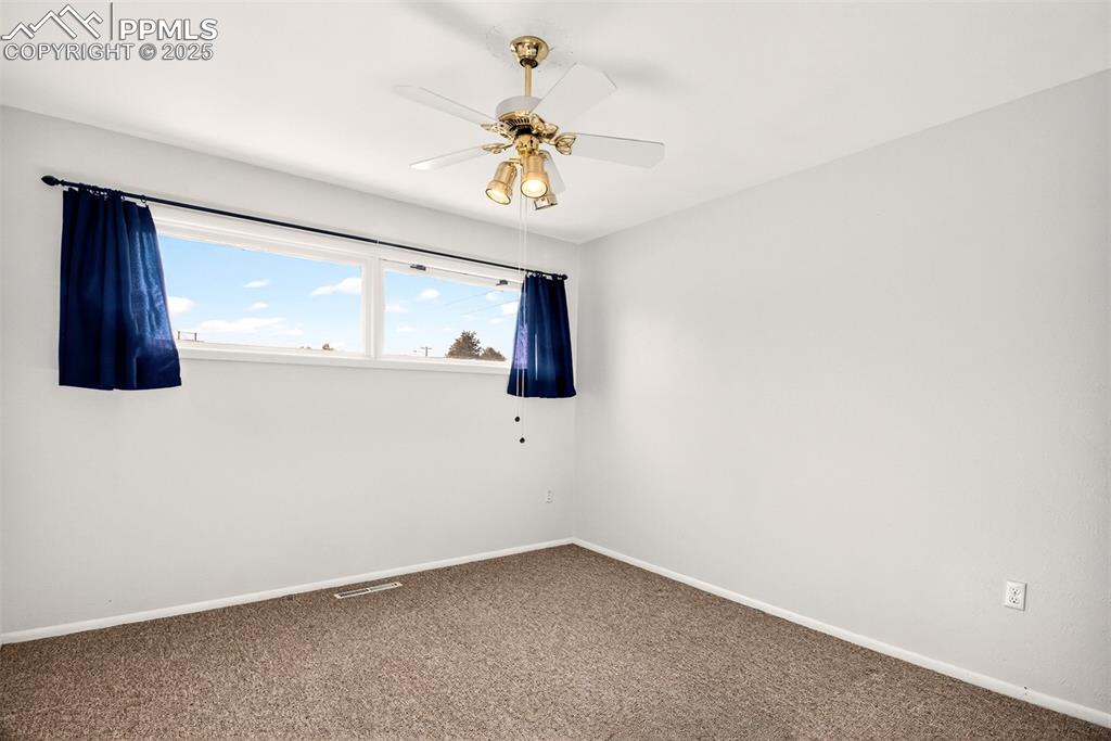 Image 8 of 21: Ceiling Fan, Hardwood Flooring Under The Carpet