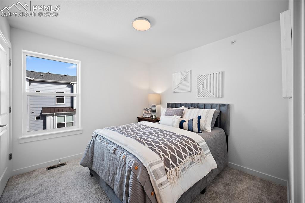 Image 12 of 21: Bedroom