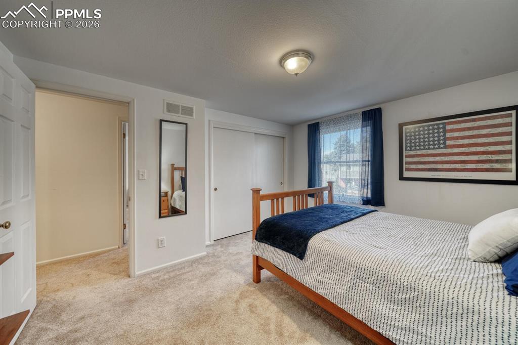 Image 27 of 43: Bedroom