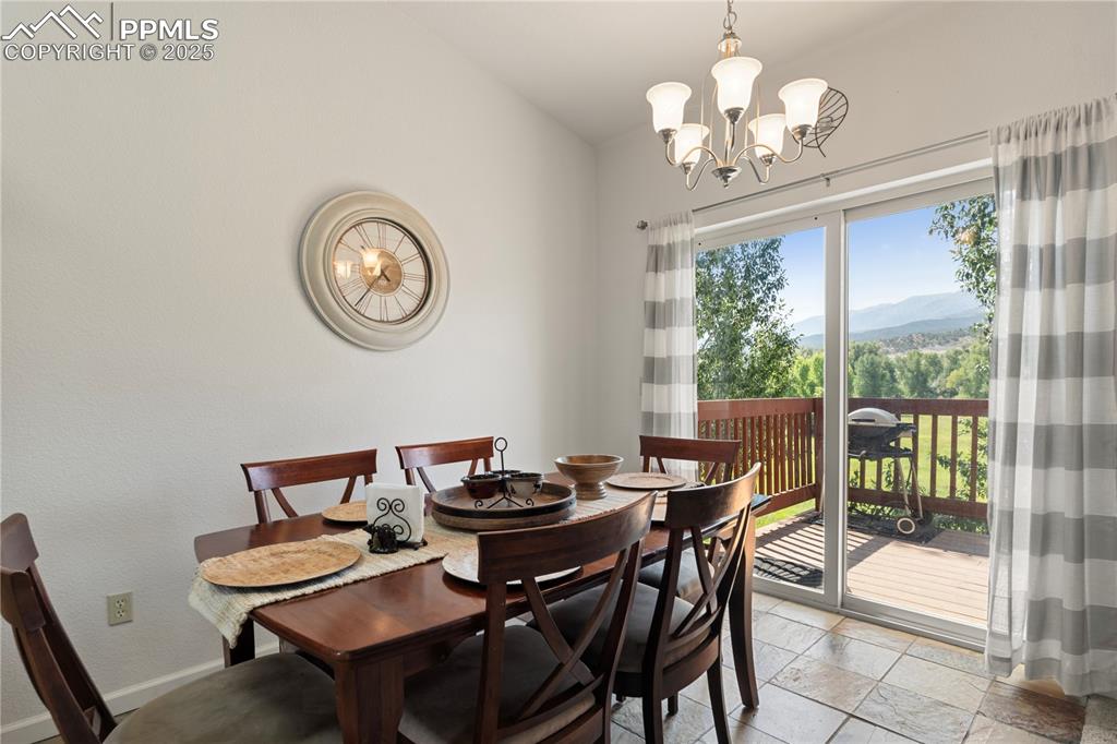 Image 11 of 27: The dining space has incredible views.