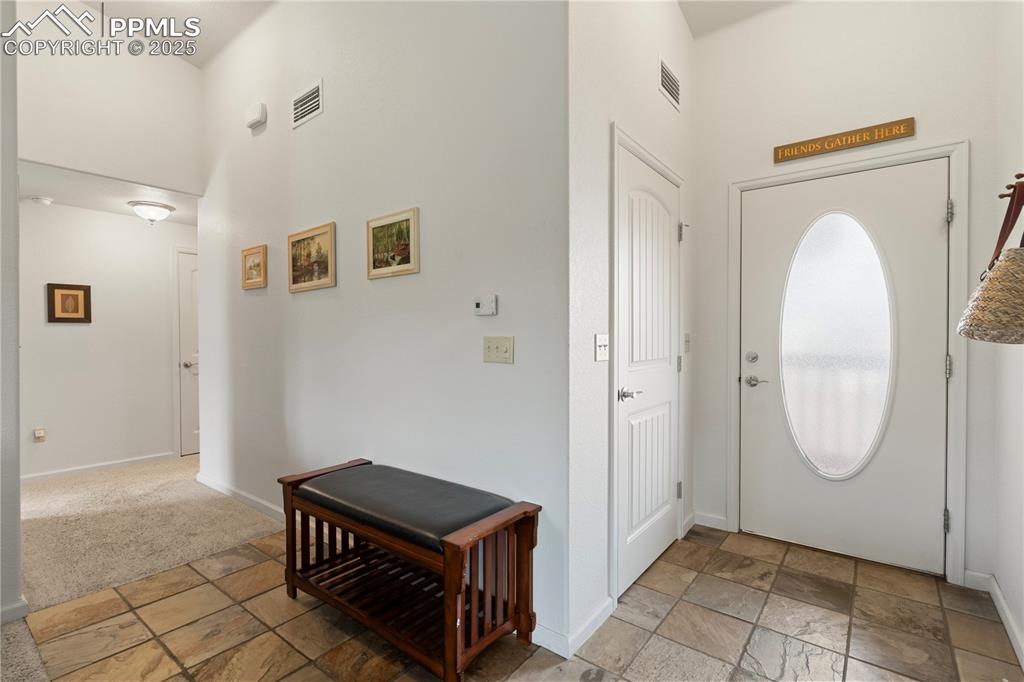 Image 13 of 27: The bedrooms are located to the right.