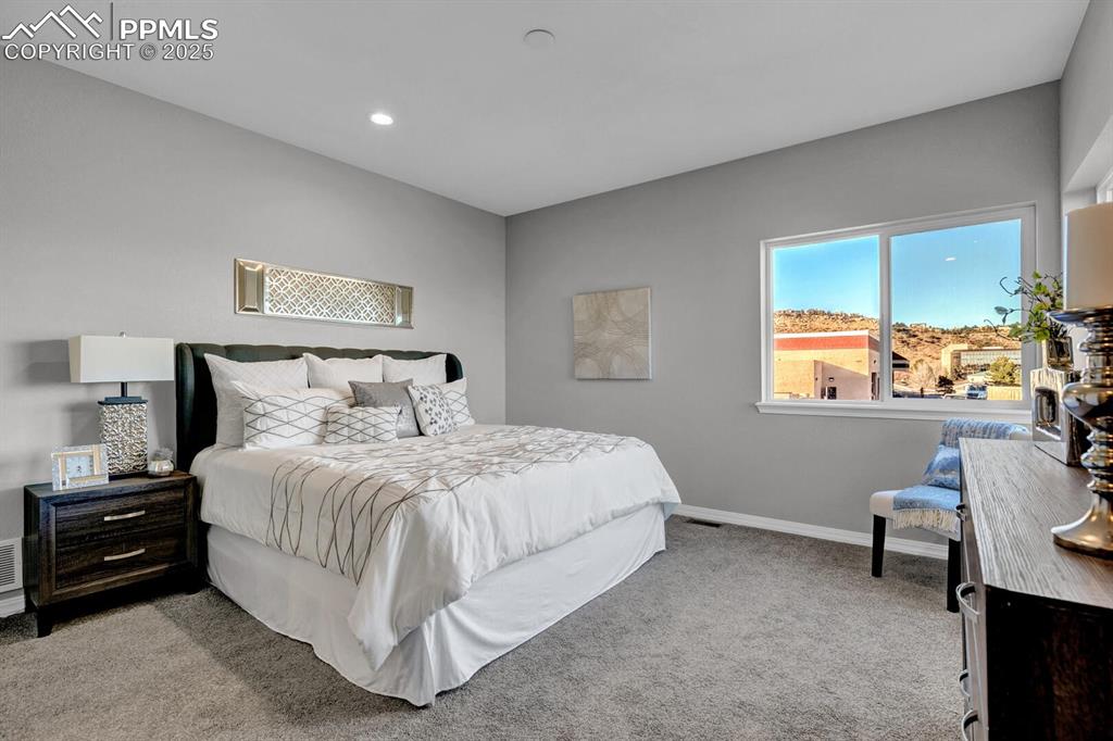 Image 33 of 48: Primary bedroom with 2 closets