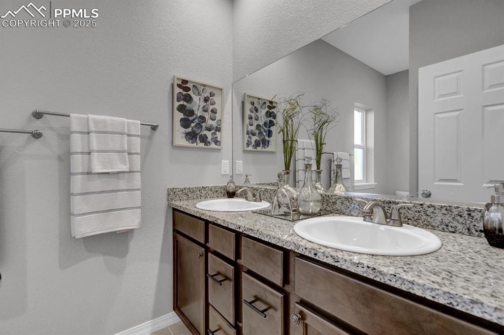 Image 37 of 48: Double sink vanity will have undermount sinks, quartz counters, and shaker