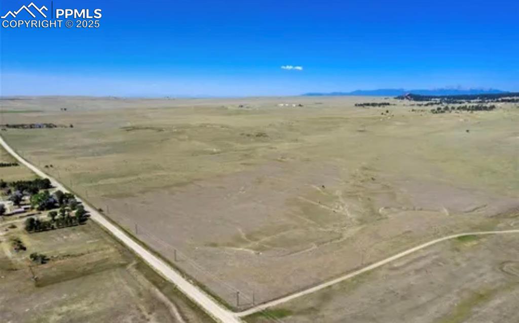 Image 9 of 9: Birds eye view of property with a rural view
