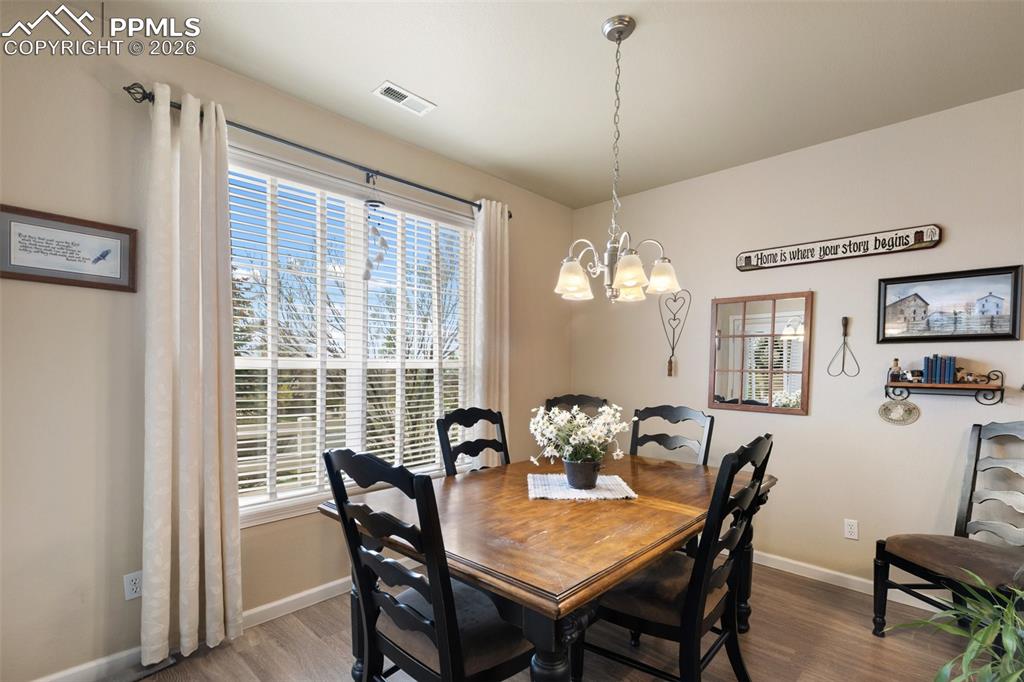 Image 10 of 29: Dining area with views of Pikes Peak
