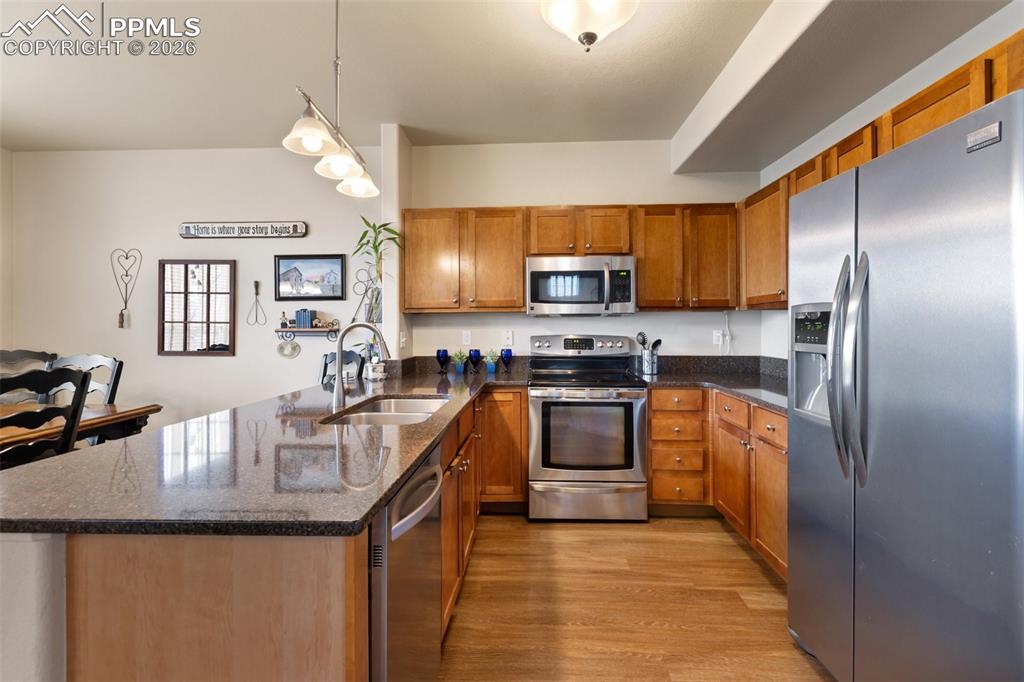 Image 11 of 29: Well designed kitchen with granite countertops