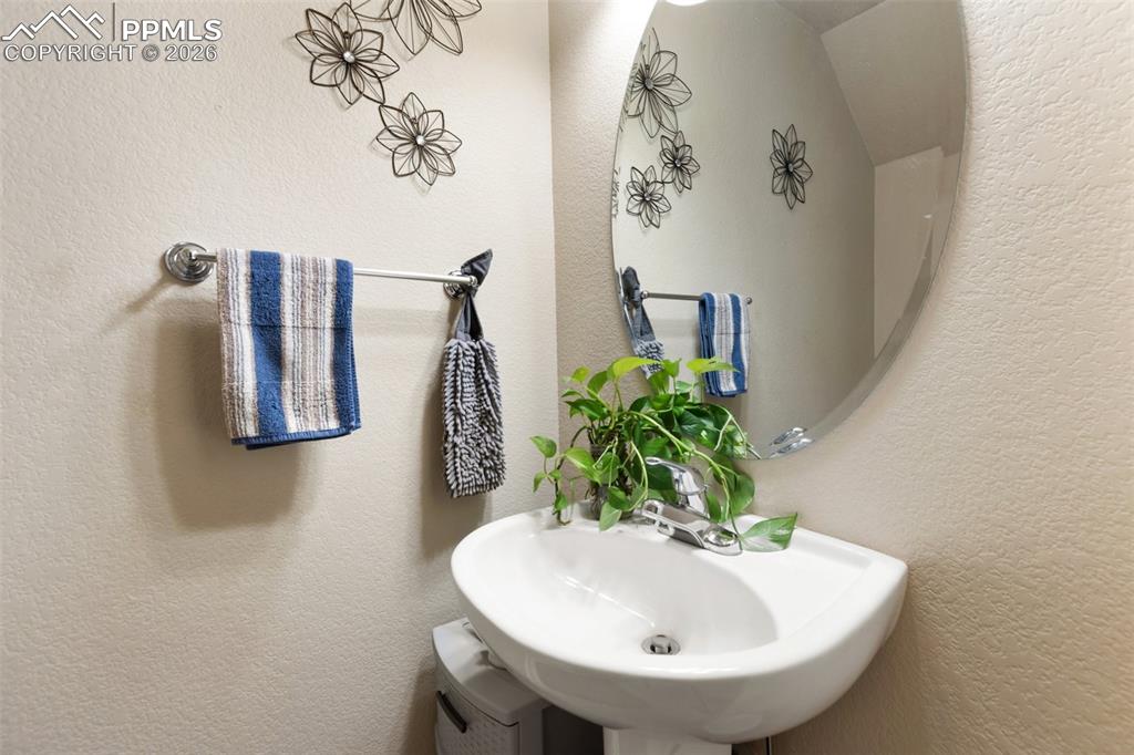 Image 15 of 29: Powder room on main level