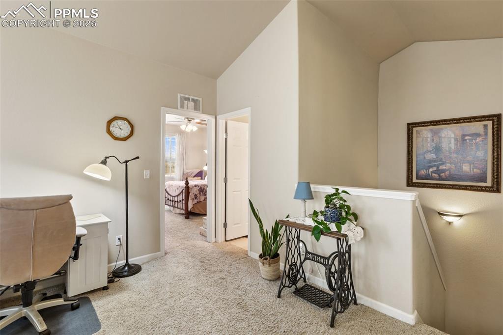 Image 24 of 29: Primary bedroom has privacy as loft is between it and other two bedrooms