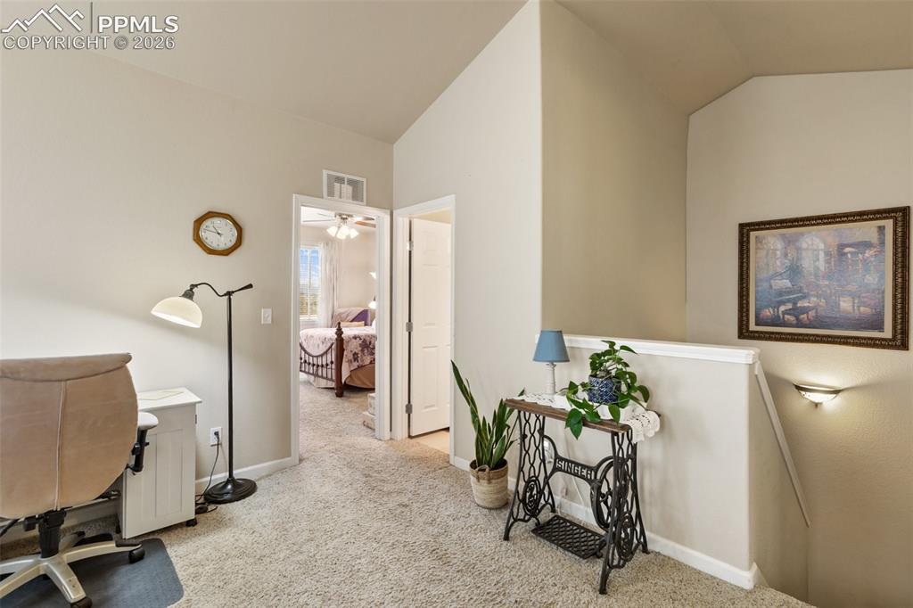 Image 24 of 29: Primary bedroom has privacy as loft is between it and other two bedrooms