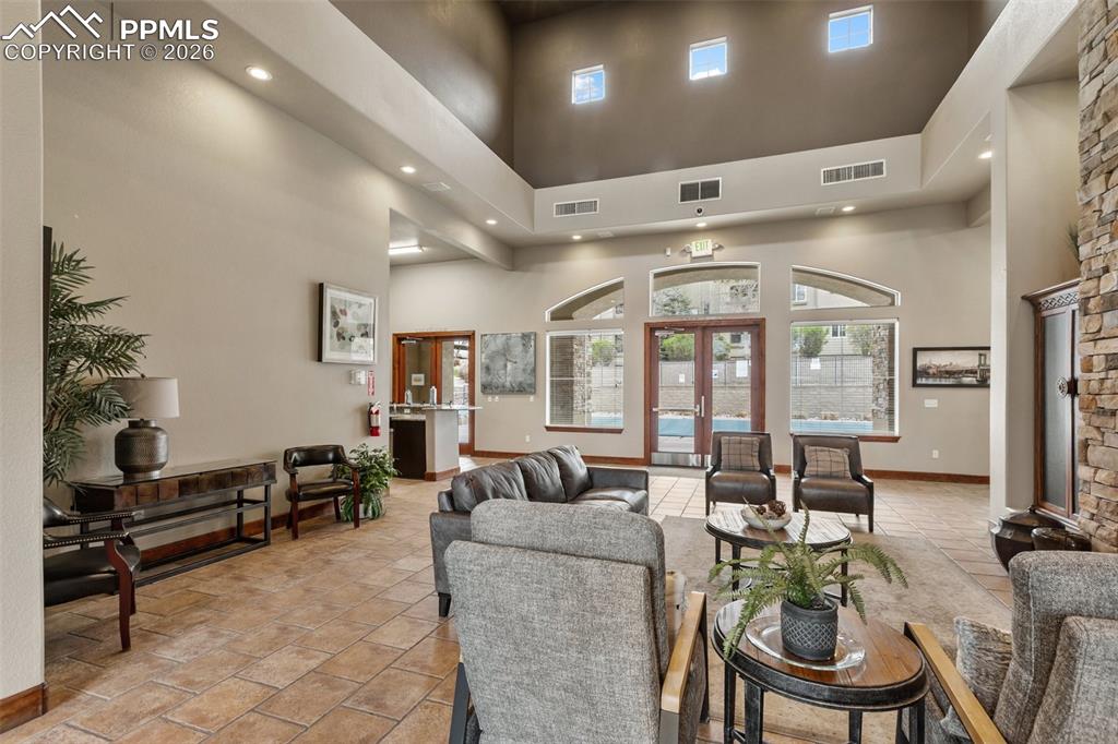 Image 27 of 29: Gathering space with kitchen and view o