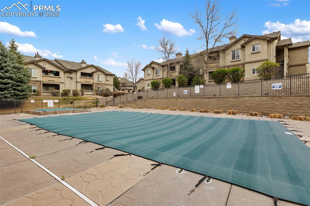 Image 29 of 29: Large pool and hot tub for summer fun