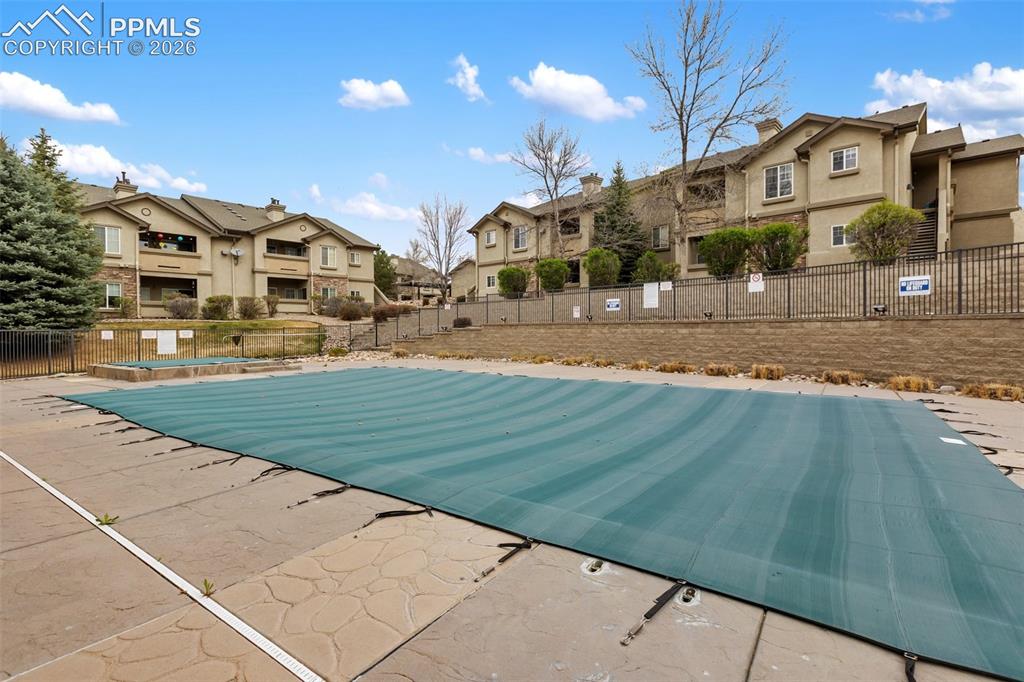 Image 29 of 29: Large pool and hot tub for summer fun