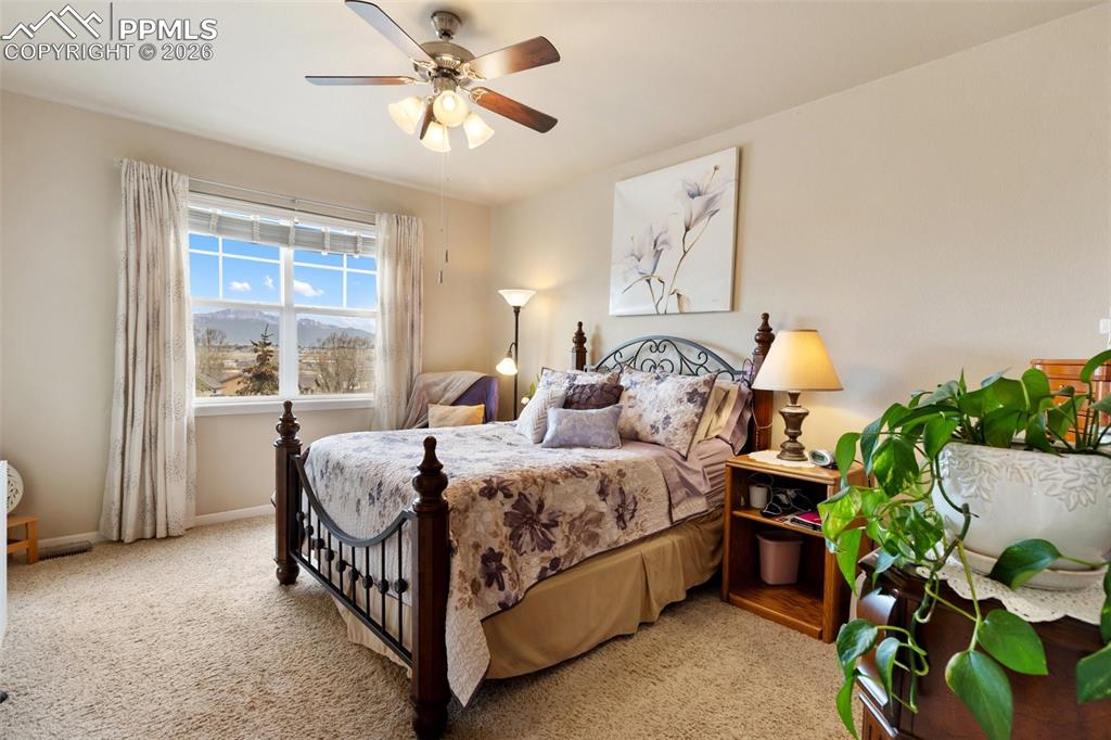 Image 5 of 29: Look at that view of Pikes Peak from the Primary Bedroom!