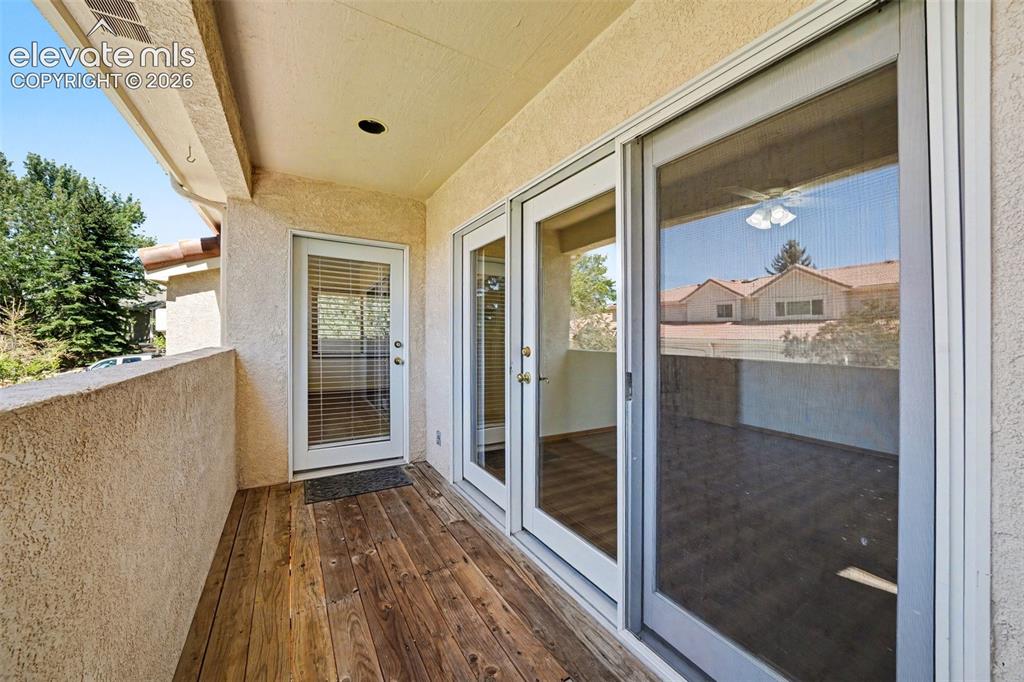 Image 26 of 47: covered and partially enclosed deck