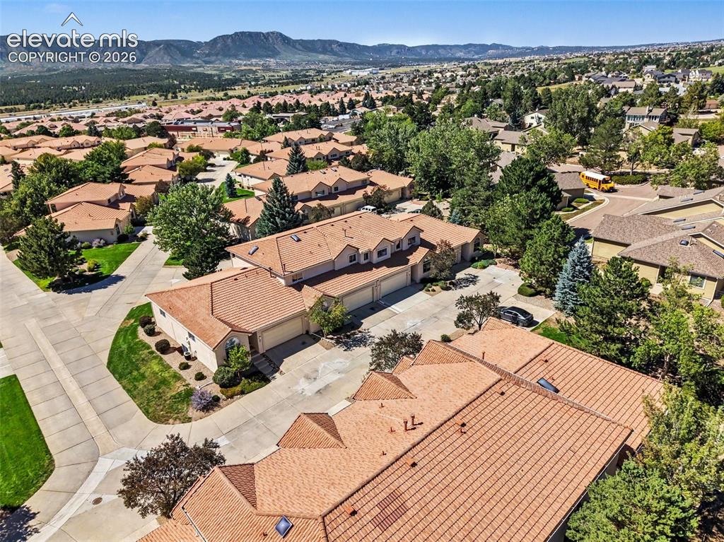 Image 42 of 47: Residential community featuring stucco exteriors and tile roofing