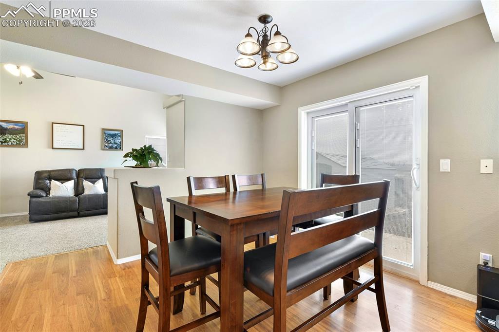 Image 13 of 30: Dining With View Into Living Room