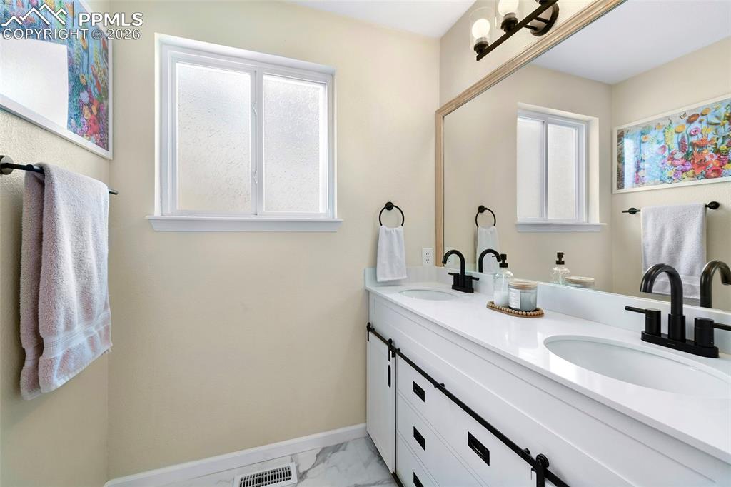 Image 19 of 30: Fully Remodeled/Updated Upper Level Bathroom
