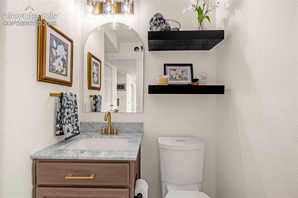 Image 15 of 44: Main Level 1/2 Bath