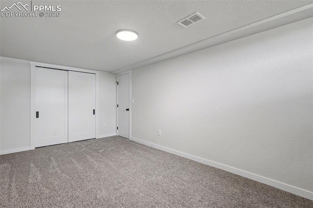 Image 16 of 38: Bedroom