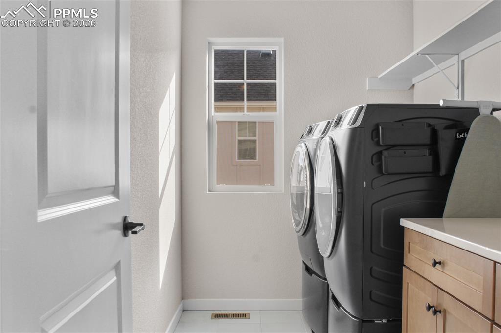 Image 26 of 30: Upstairs Laundry 