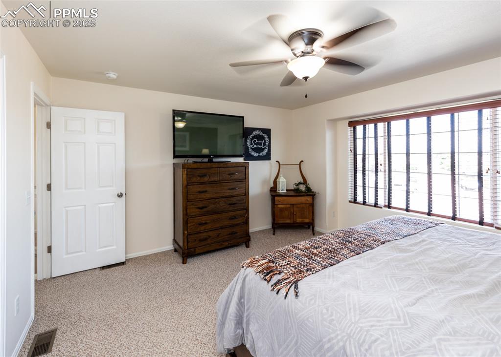 Image 25 of 50: Master Bedroom