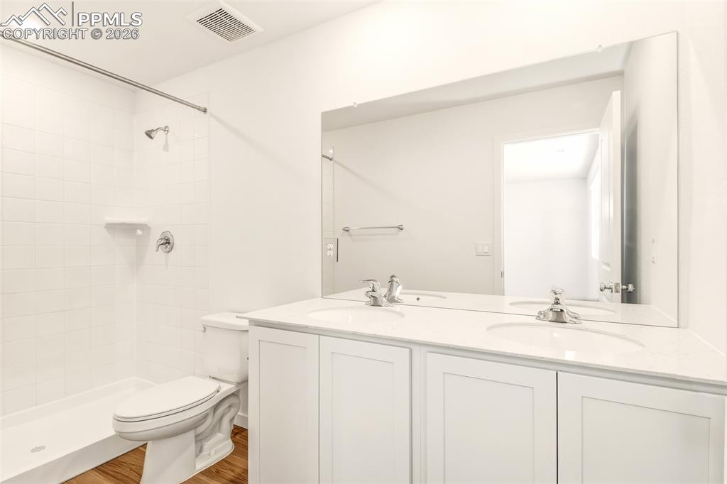 Image 10 of 35: Primary Bathroom, double vanity